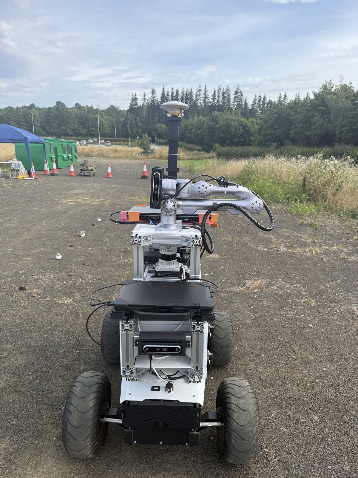 ALFRED 2.0 field robot, front view, showing its manipulator arm and mast-mounted sensors